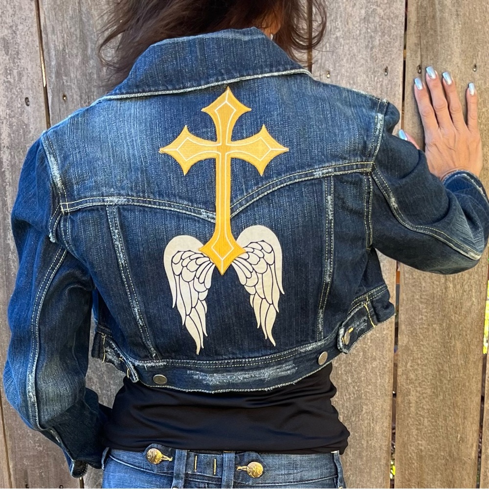 Ladies jacket… distressed denim, cropped jacket. Wings and cross on back. Sz M